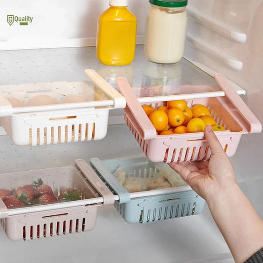 Adjustable stretchable plastic fridge storage basket by Carevix Store, versatile food organizer with multiple compartments.