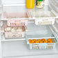 Adjustable stretchable plastic fridge storage basket by Carevix Store, versatile food organizer for efficient kitchen storage.