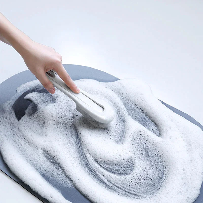 Close-up of a modern Carevix super absorbent, quick-drying bath mat with non-slip backing and contemporary welcome design.