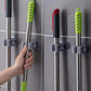 1 Pc Self-Adhesive Mop & Broom Holder – Wall Mounted Magic Organizer for Cleaning Tools (Random Color)